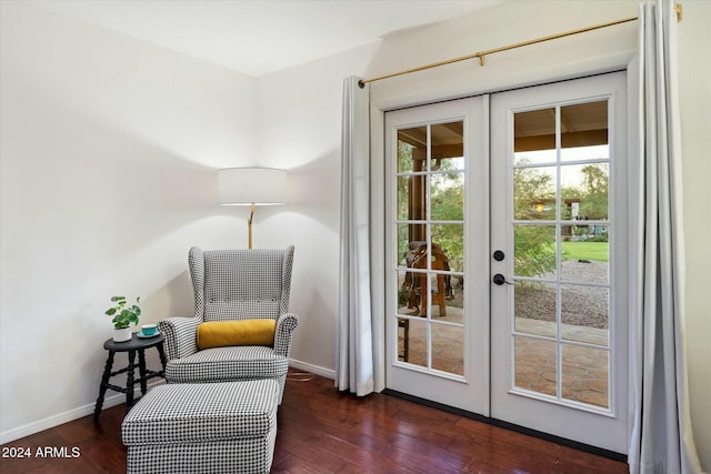 entryway with dark wood-type flooring and french doors