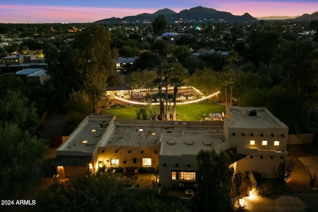 aerial view at dusk with a mountain view