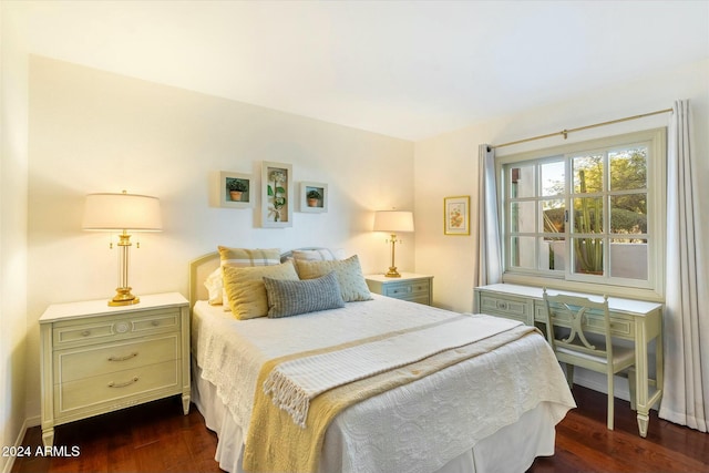 bedroom featuring dark hardwood / wood-style flooring