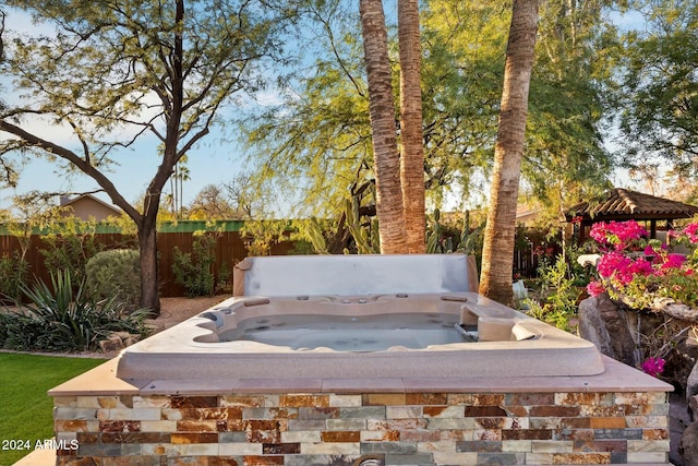 view of patio / terrace with a gazebo and a hot tub