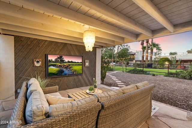 patio terrace at dusk with outdoor lounge area