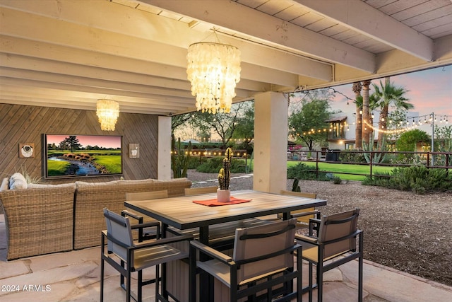 view of patio terrace at dusk