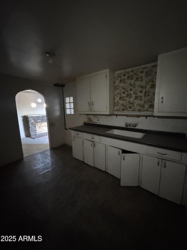 kitchen with sink and white cabinets