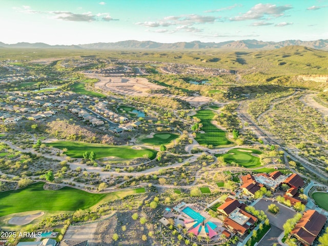 bird's eye view featuring view of golf course and a mountain view