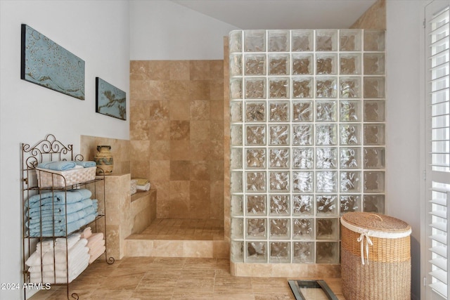 bathroom featuring tiled shower