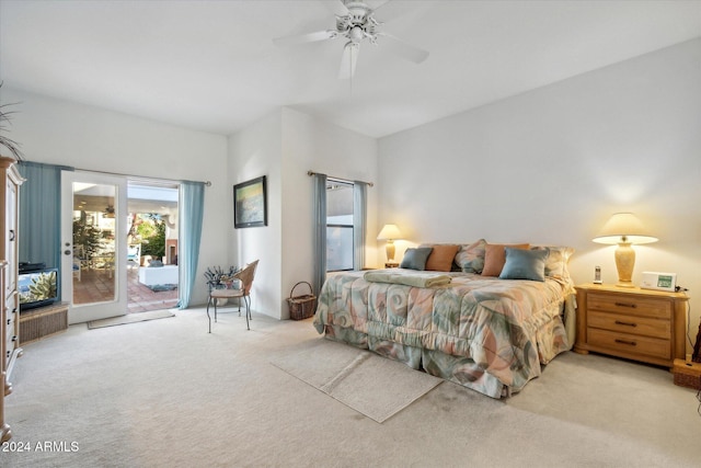 carpeted bedroom with ceiling fan and access to outside