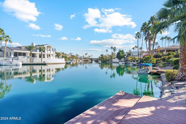 view of dock with a water view