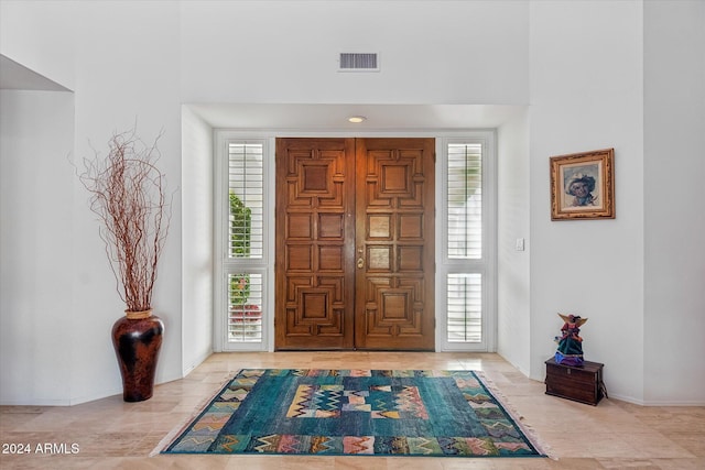 entrance foyer featuring plenty of natural light