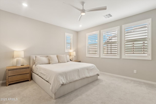 carpeted bedroom with ceiling fan