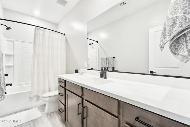 full bathroom with toilet, vanity, and shower / bathtub combination with curtain