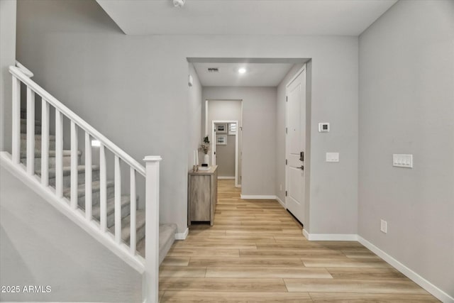 foyer entrance featuring light hardwood / wood-style floors