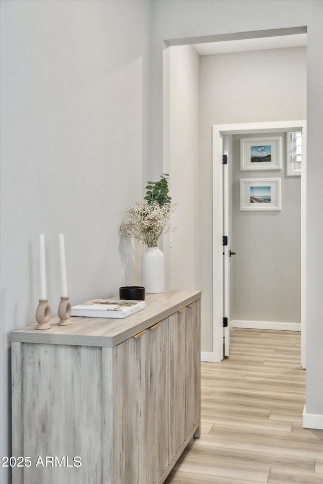 corridor featuring light hardwood / wood-style flooring