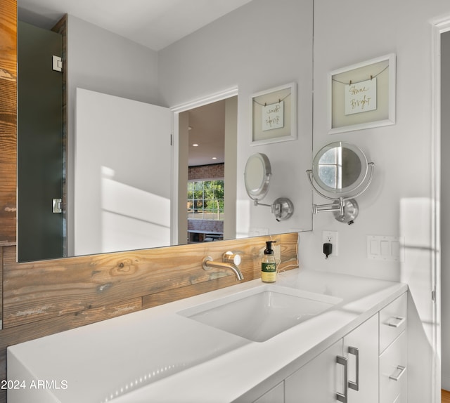 kitchen featuring sink and white cabinets