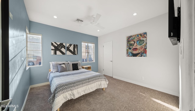 carpeted bedroom with ceiling fan