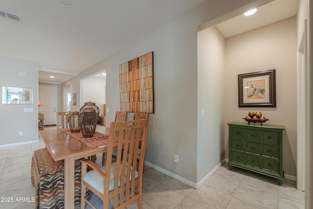 dining room featuring light tile patterned floors