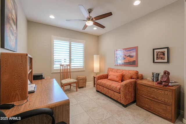 office area with ceiling fan and light tile patterned floors