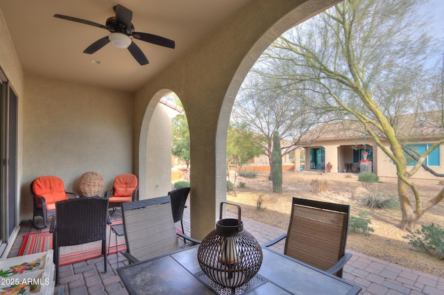 view of patio with ceiling fan