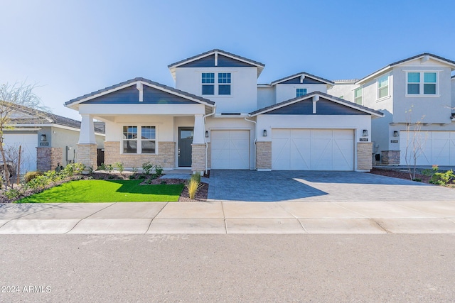 craftsman inspired home with a garage