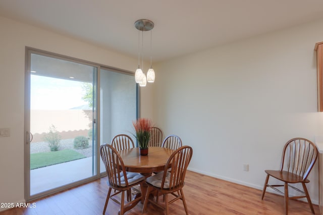 dining room featuring light wood-type flooring