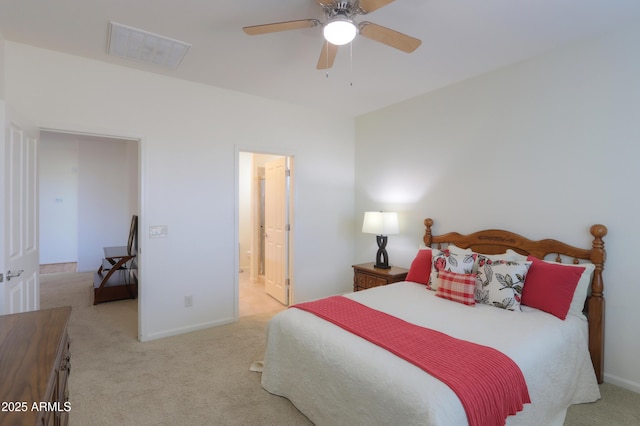 carpeted bedroom featuring ceiling fan and connected bathroom