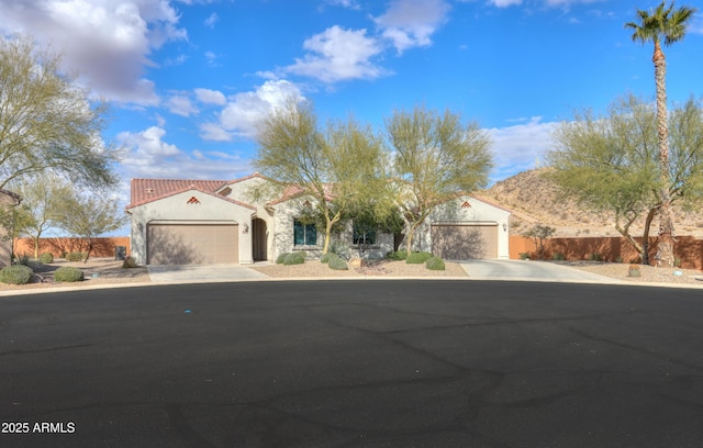 view of front of property with a garage