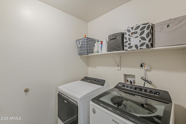 laundry area with laundry area and washer and dryer