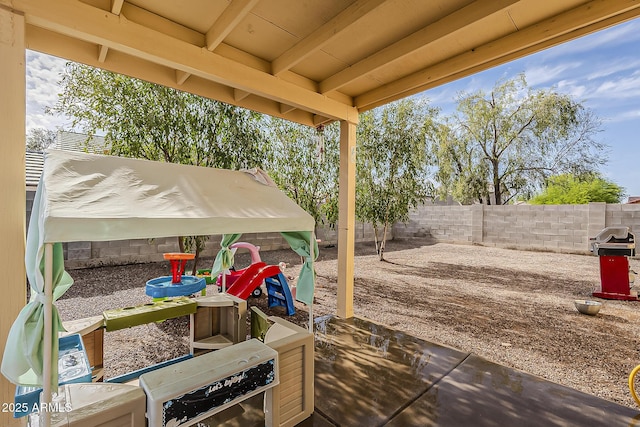 view of patio with a fenced backyard