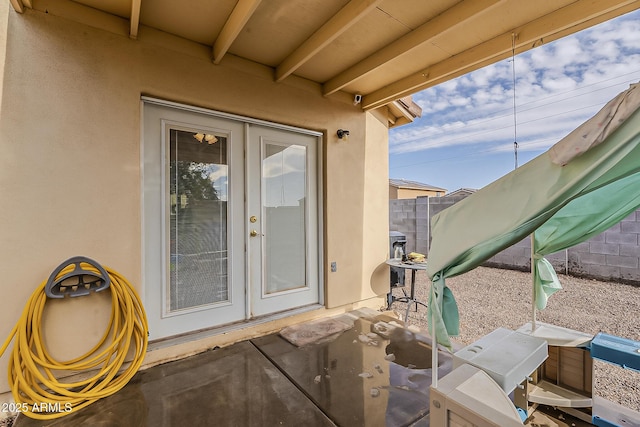 view of patio featuring fence