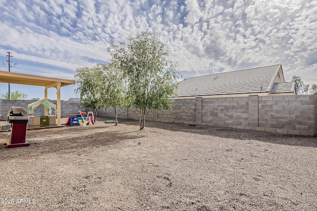 view of yard featuring a fenced backyard