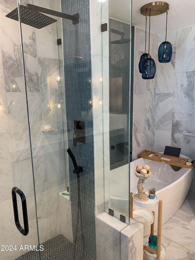 bathroom with independent shower and bath