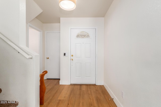 doorway featuring light hardwood / wood-style floors