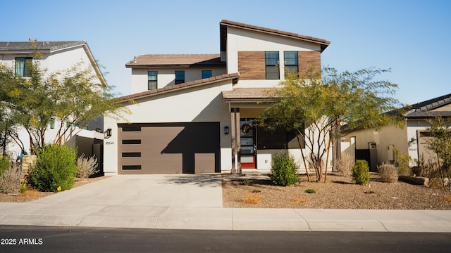 view of front of property with a garage