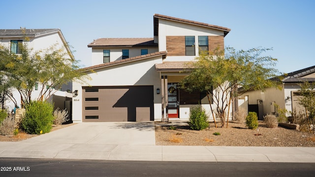 view of front of property featuring a garage