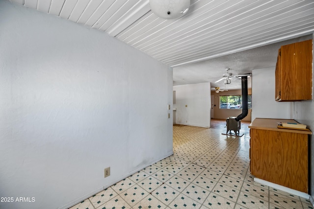 312 W Saddle Ln, Payson, AZ 85541 - kitchen featuring light floors, a ceiling fan, and brown cabinets