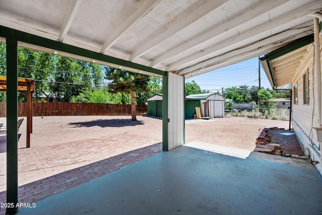 312 W Saddle Ln, Payson, AZ 85541 - fenced backyard with a storage unit and a patio area