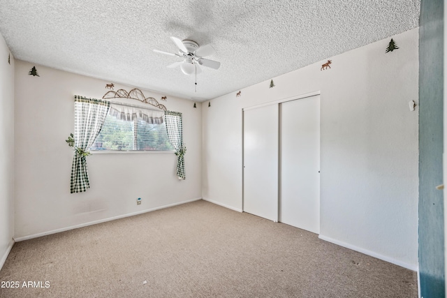 312 W Saddle Ln, Payson, AZ 85541 - unfurnished bedroom featuring carpet flooring, a closet, a textured ceiling, and a ceiling fan