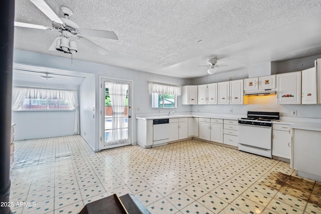 312 W Saddle Ln, Payson, AZ 85541 - kitchen with white appliances, a ceiling fan, under cabinet range hood, light countertops, and a textured ceiling