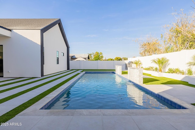 view of swimming pool with a patio, a fenced backyard, and a fenced in pool