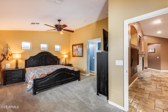 bedroom with lofted ceiling and ceiling fan