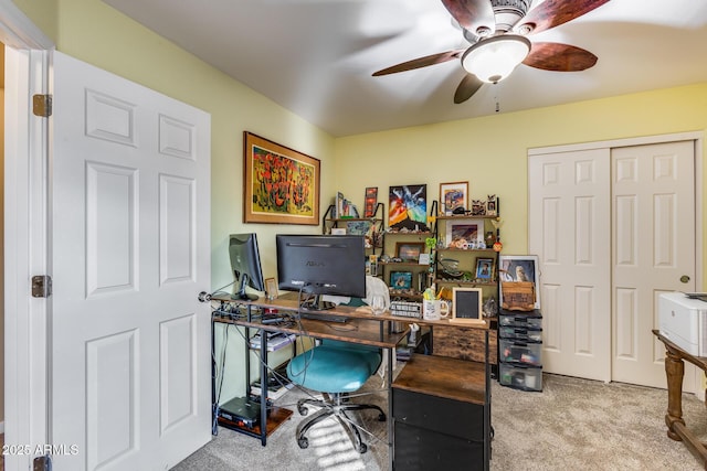 office area with light carpet and ceiling fan