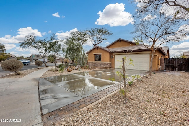 ranch-style home featuring a garage