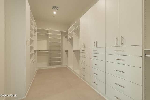 walk in closet with visible vents