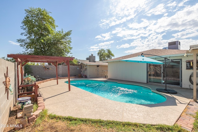 view of swimming pool with a pergola and a patio