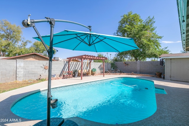 view of pool featuring a patio area and a pergola