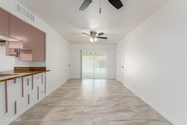 kitchen featuring ceiling fan