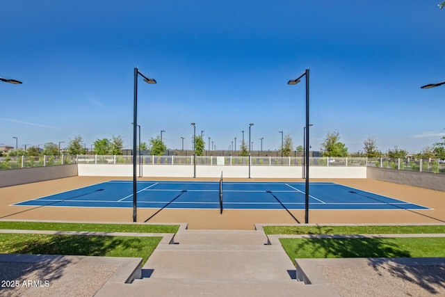 view of basketball court featuring tennis court