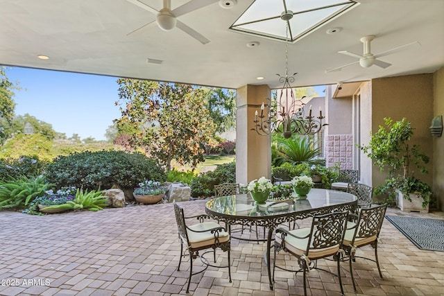 view of patio / terrace featuring outdoor dining space and ceiling fan