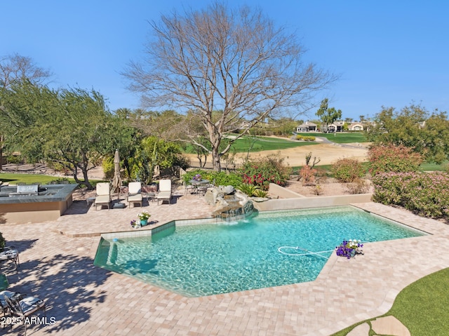 outdoor pool featuring a patio area