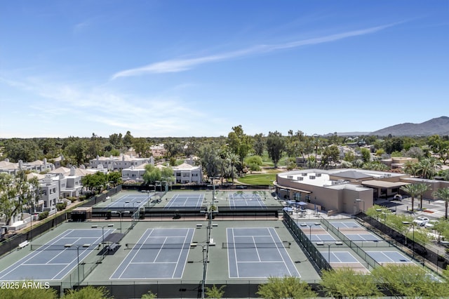 birds eye view of property with a mountain view