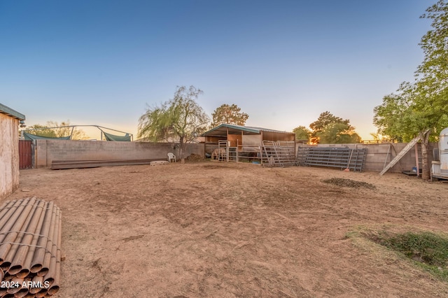 6415 W Roosevelt St, Phoenix, AZ 85043 - view of yard with an outbuilding and an exterior structure